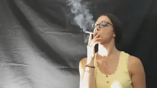 smoking in front of a black screen