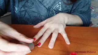 Red nails polishing