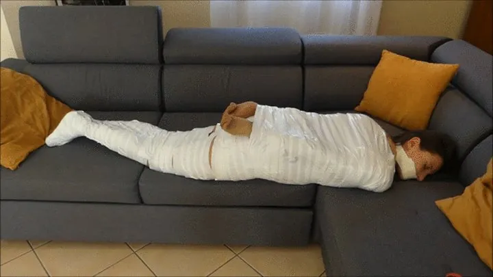 Chloe mummification in white tape