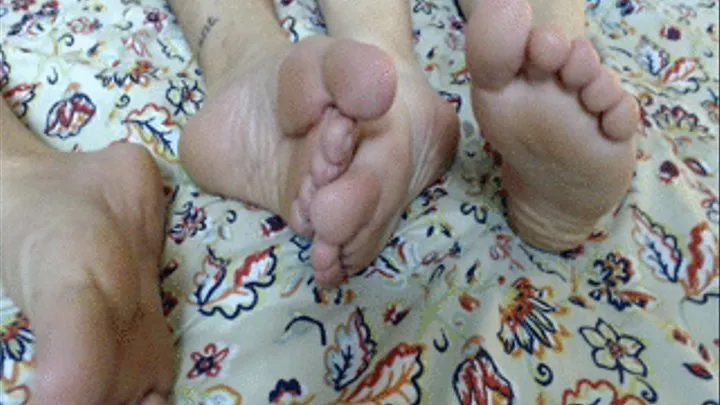 Two pairs of beautiful natural feet