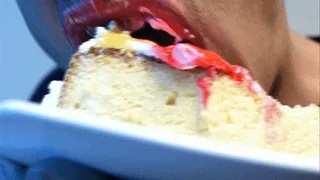 Eating cake with his mouth