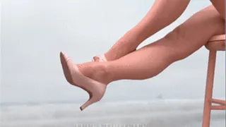 Woman Kicks Her Legs And High Heels At The Beach