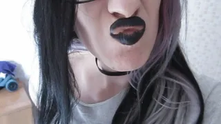 Smelling black lips while wearing eye glasses