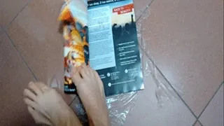 Tearing up a magazine with my feet