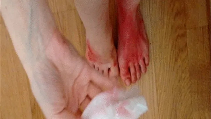 Cleaning my feet from red paint