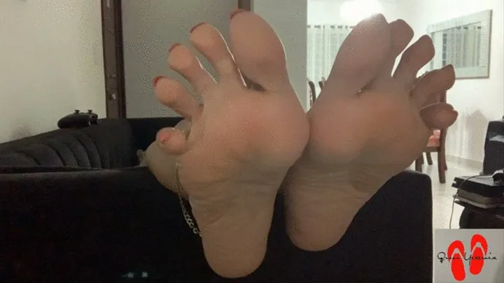 Feet Hanging Over the Sofa