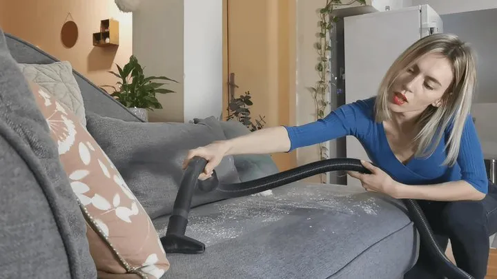 Alanna vacuum the couch and her feet