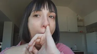 a finger in the nose