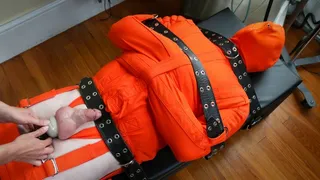 Squeeze an Orange - Patrick and Elise Graves - Elise Restrains Bondage Slut Patrick in Orange Straitjacket, Leg Binder and Hood before Teasing the Hell out of him!