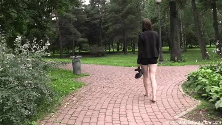 Young 18-year-old gothic girl Maria barefoot in a public park (Part 3 of 6)