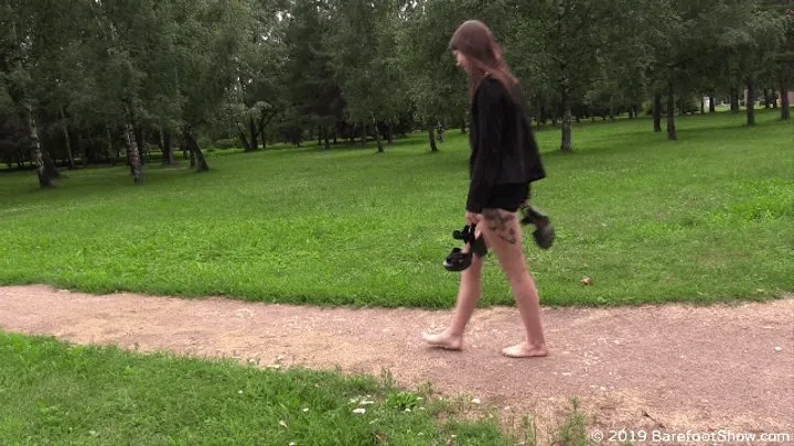 Young 18-year-old gothic girl Maria barefoot in a public park (Part 1 of 6)