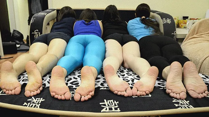 Four barefoot girls Anna, Maria, Sasha and Varya shows their soles on the couch (Part 2 of 6)