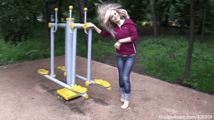 Glamor blonde barefoot in a sports park (Part 5 of 6)