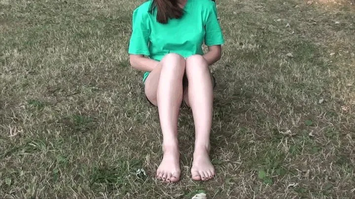 Young 19-year-old sexy barefoot girl from street on the grass (Part 1)