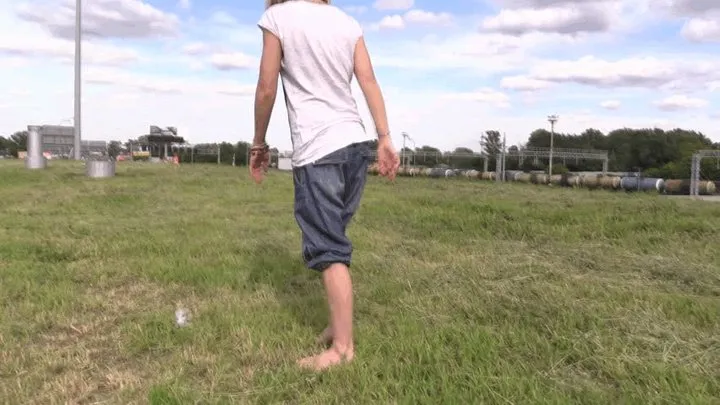 Sexy blonde barefoot on the grass (Part 2)