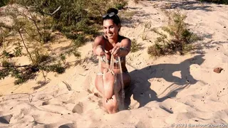 Beautiful Olivia shows off her huge feet on a public beach (Part 1 of 2)