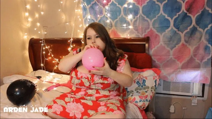 Blowing Up 3 Balloons in a Red Dress