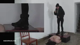 Mistress Natasa tramples the slave's groin with snowy boots, past her orgasm A picture in a picture