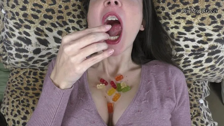 Hungry giantess with braces devours gummy bears