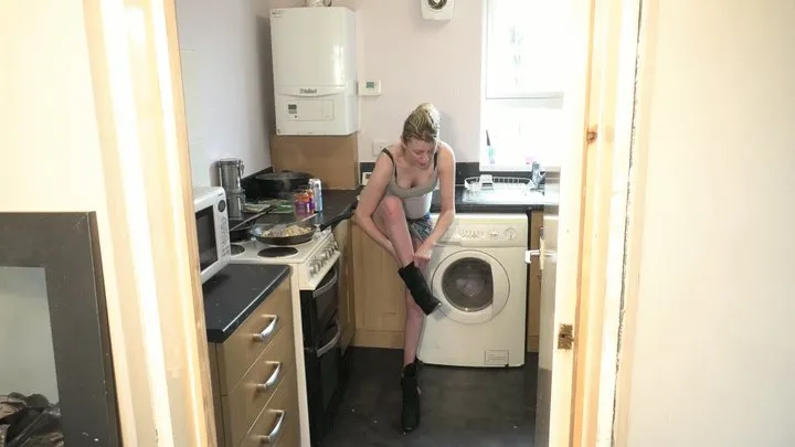 Chelsea Cooking In High Heel Boots Whilst Stood On Her Slaves Head