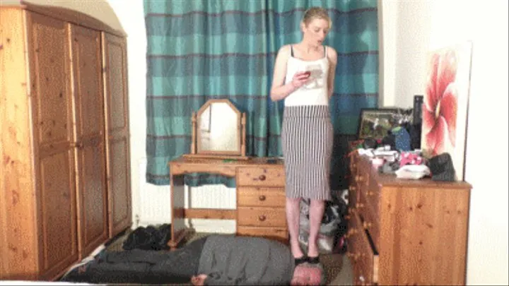 Classy Girl Stands On Her Slaves Head In Shiny Black High Heels Whilst Sipping