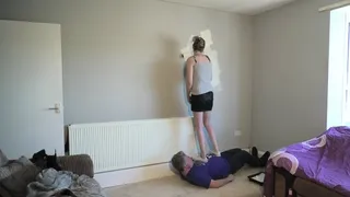 Chelsea Steps On Her Slave Whilst Painting The Wall