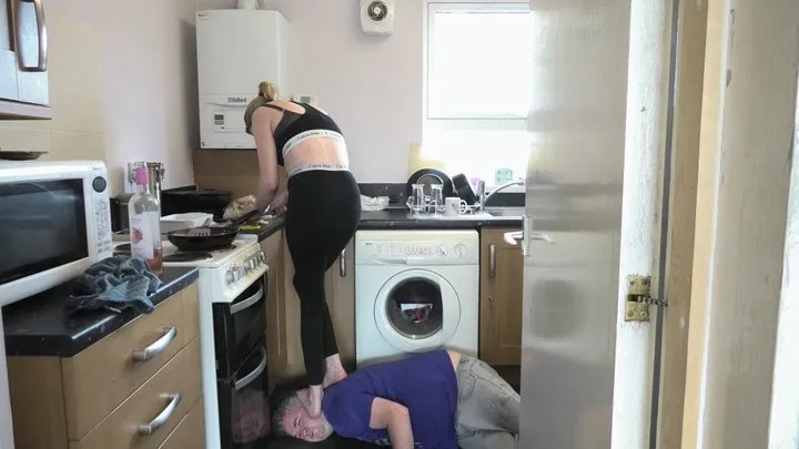 Cooking A Meal For The Family Whilst Stepping On Him With Her Bare Feet