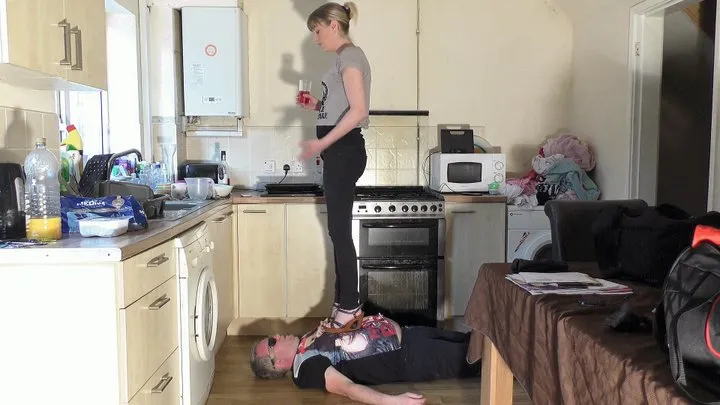 Chelsea Trample With Her Wooden Wedge Shoes On The Kitchen Floor