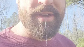 Bearded man drools for one minute straight