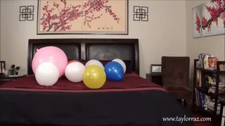 Sexy Sasha sits on her balloons