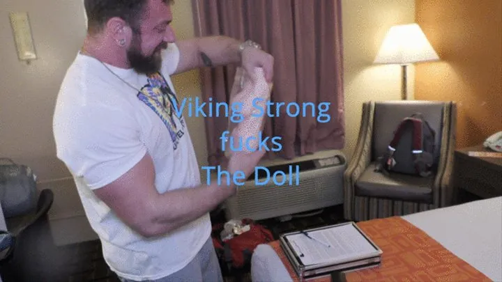 Bodybuilder Viking Strong fucks the doll