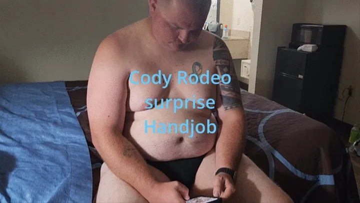 Beefy Chub Cody Rodeo gets a handjob from a guy