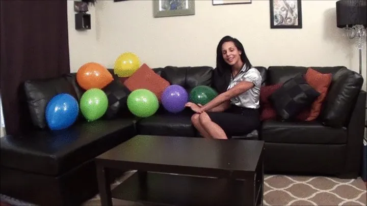 Mandy sits on her balloons