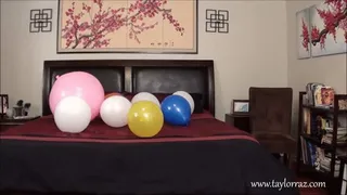 Sasha pops her balloons