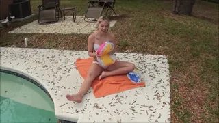 Kat plays with her beachballs