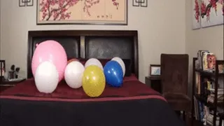 Sasha pops some balloons!