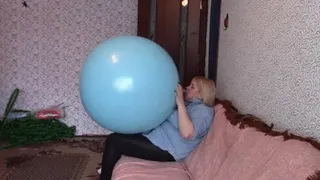 Inflate and blow a huge balloon