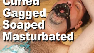 Pinion Cuffed Gagged Soaped Masturbated