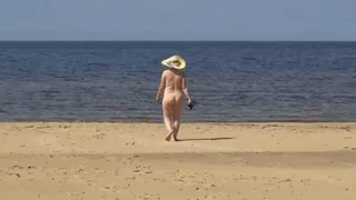 Naked hot MILF on nude beach