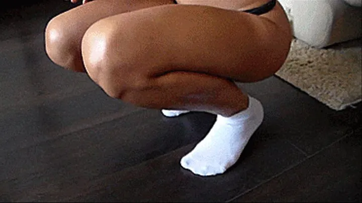 legs in oil, wearing sexy socks on their heels, legs with erotic movements