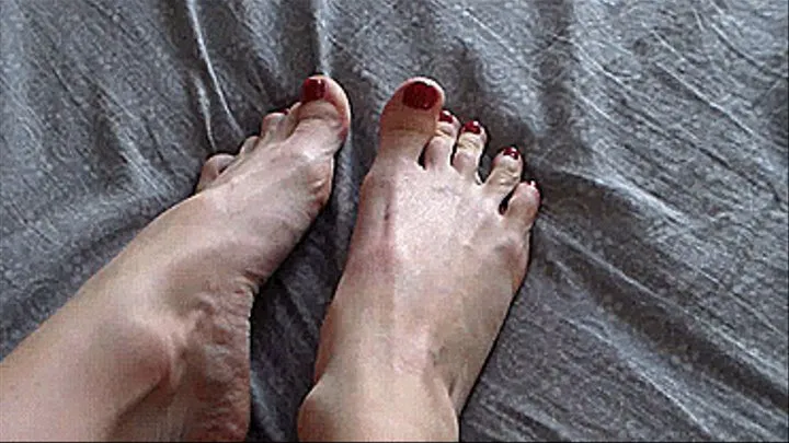 My beautiful toenails are red-lacquered
