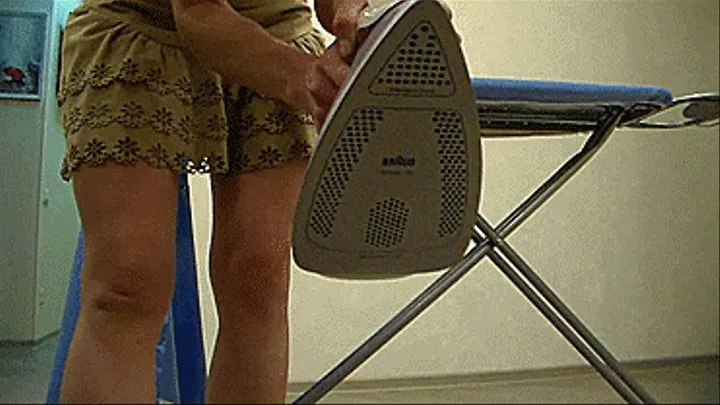 Sexy ironing in a mini skirt