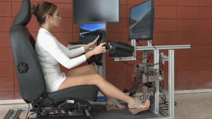 Lucy Drives a Simulated Vehicle With an Automatic Transmission