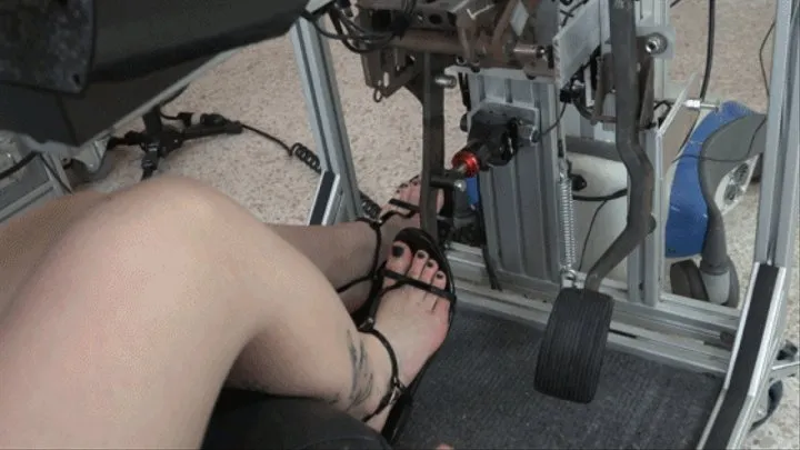 Rae Evaluates a Variety of Black Sandals for Driving in the Simulator