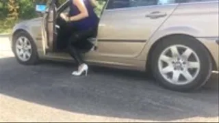 Fast driving in white heels and leather pants