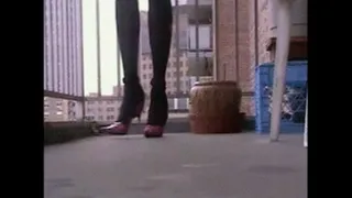 Man has Sexy Pink Heels on Terrace