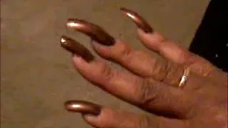 Lady uses her Long Sharp nails and long toenails to make man let her finger fuck him
