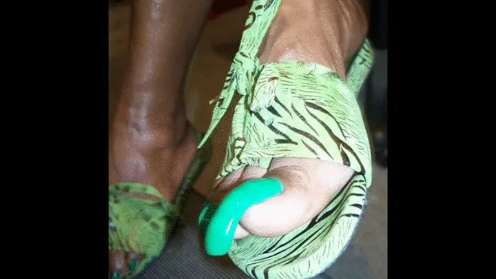 Lovely Bare Ebony Feet with Green Toenails Long Like Claws