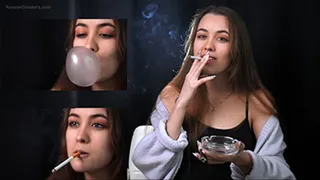 Bubblegum blowing and smoking two 120mm cork cigarettes