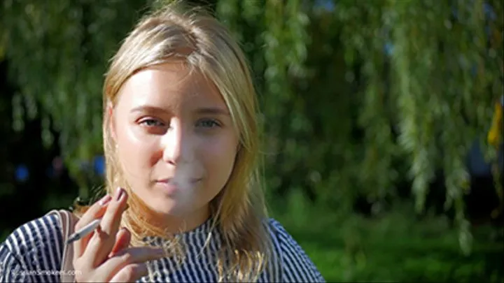 Pretty Polina is smoking 120 cork cigarette